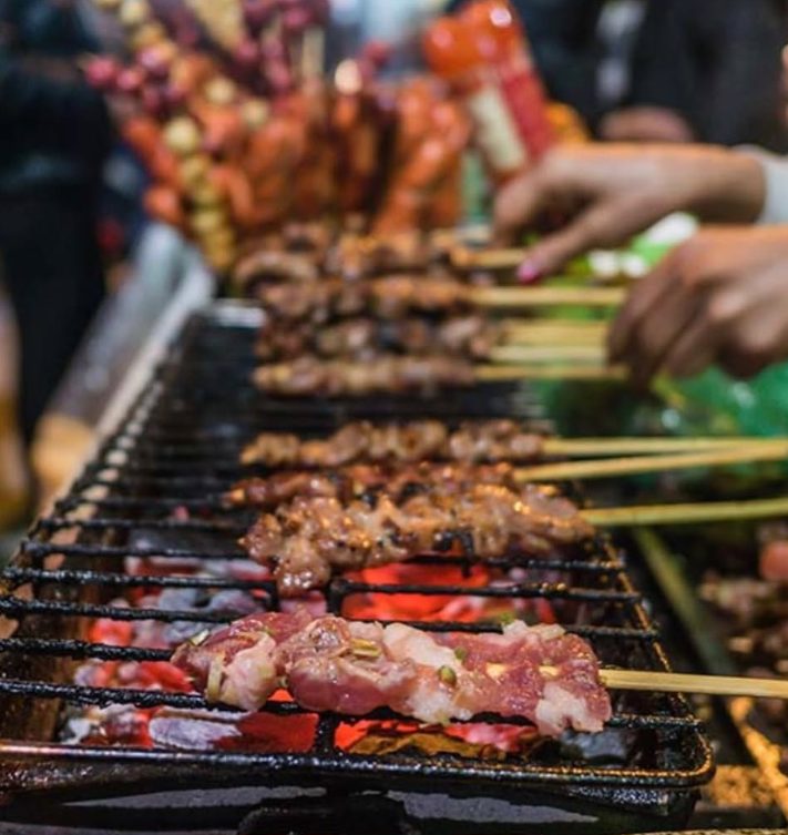 Skewers on the grill at a night market